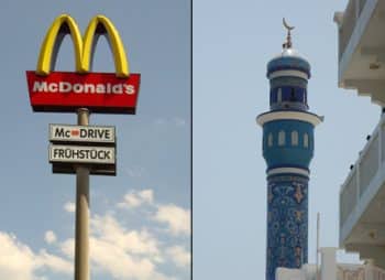Zwei städtebauliche gut sichtbare Symbole mit Anfangsbuchstaben "M"... Rechts: Minarett in Muscat, Oman